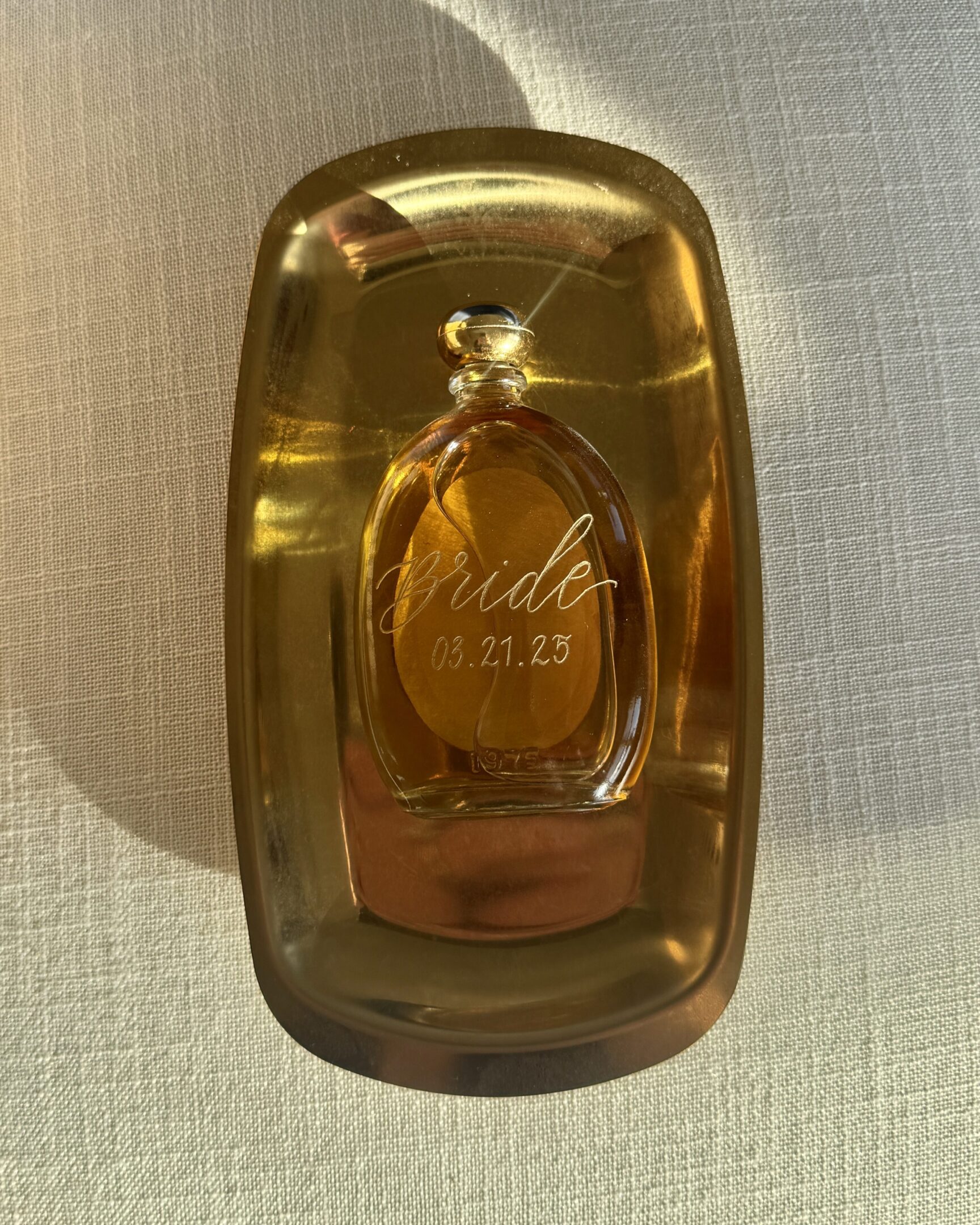 Stylish fragrance bottle with date engraving