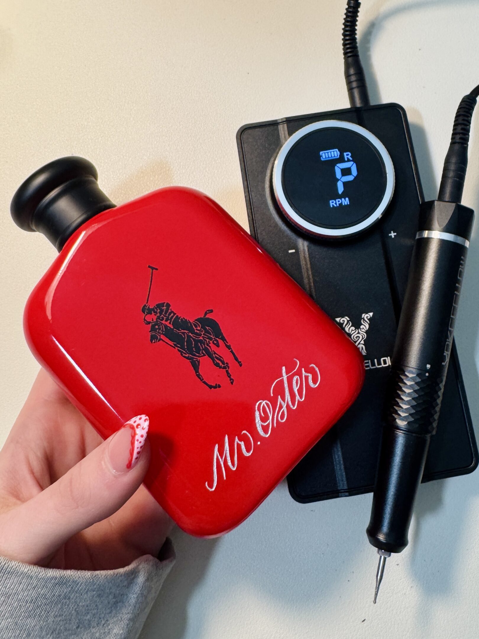 A red flask with a Polo logo and 'Mr. O'Brien' inscription.